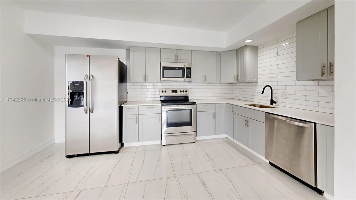 South Florida Real Estate | View 220 SW 8th Ave, 2 | Listing