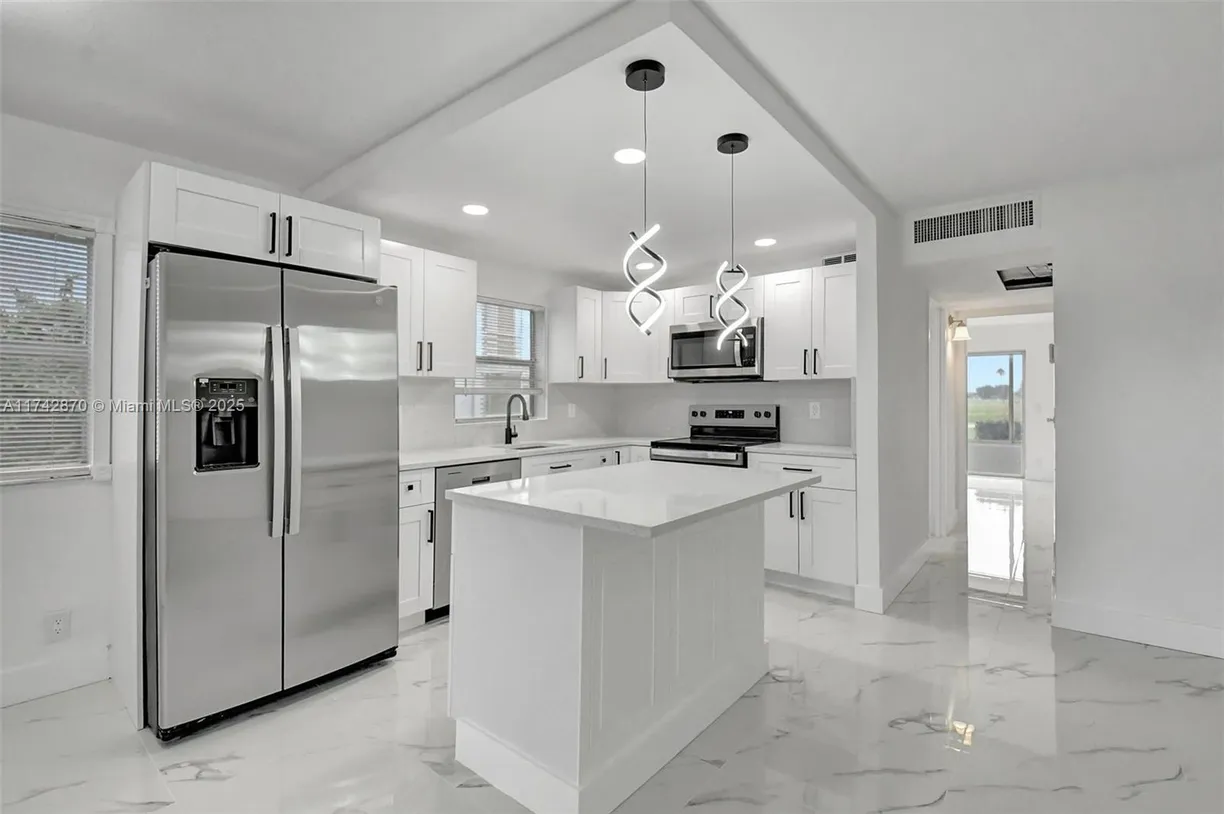 South Florida Real Estate | View 265 E Tuscany  E, 265 | Listing
