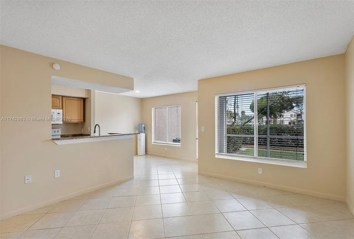 South Florida Real Estate | View 815 W Boynton Beach Blvd, 12-102 | Listing