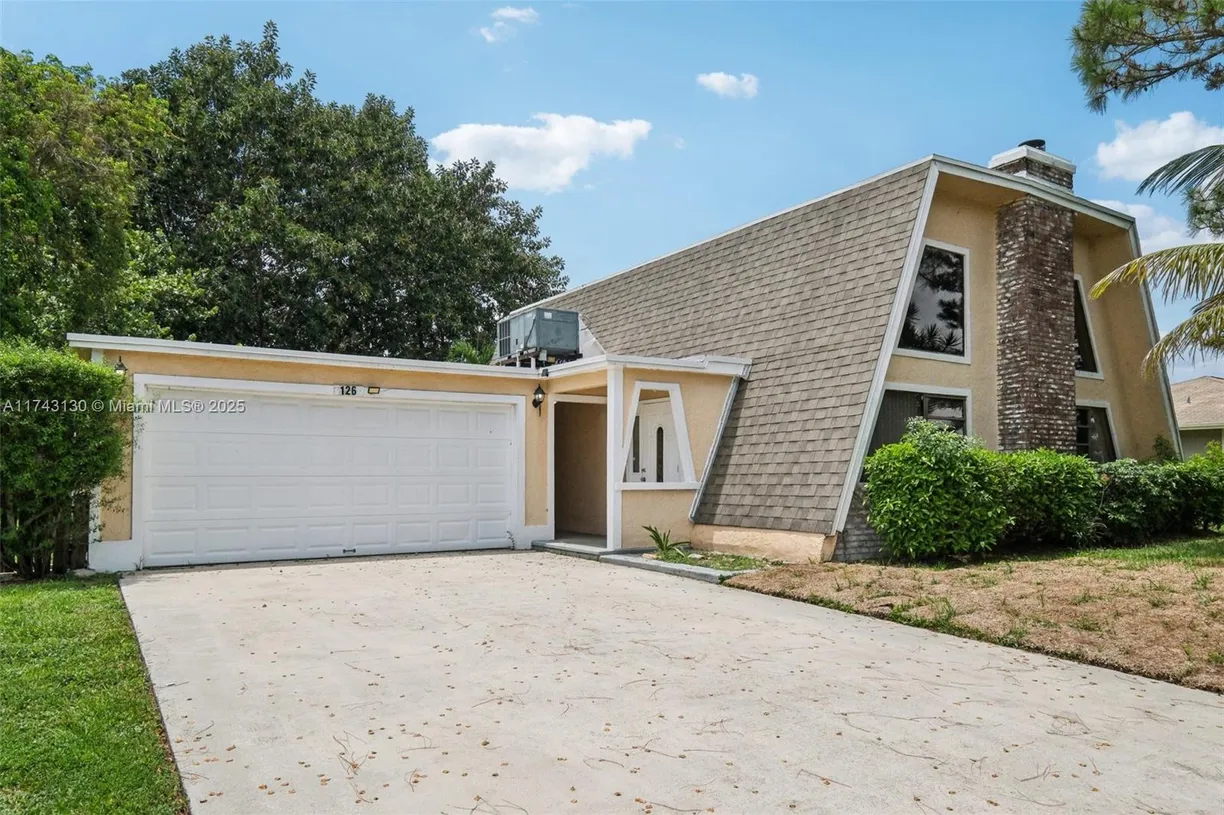 South Florida Real Estate | View 126 Barcelona Dr | 3 Beds, 2 Baths