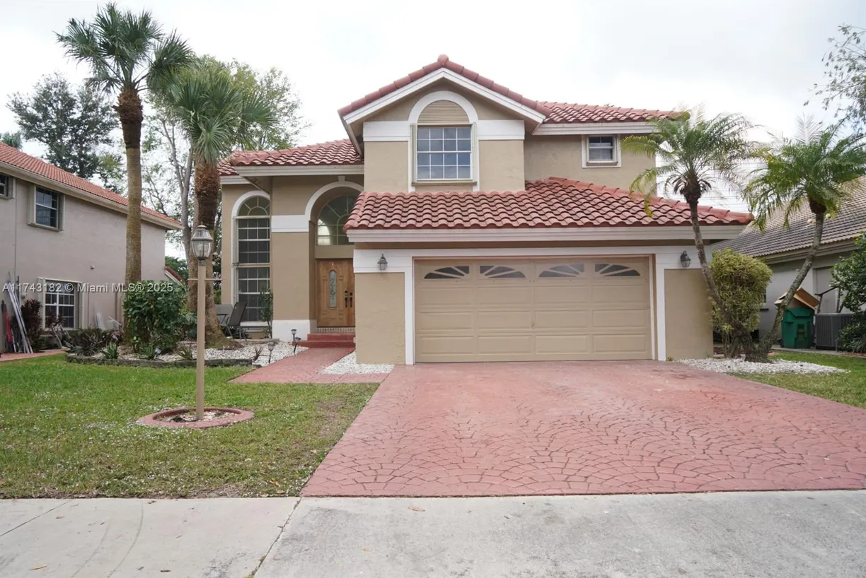 South Florida Real Estate | View 11080 Springfield Pl | 3 Beds, 2 Baths