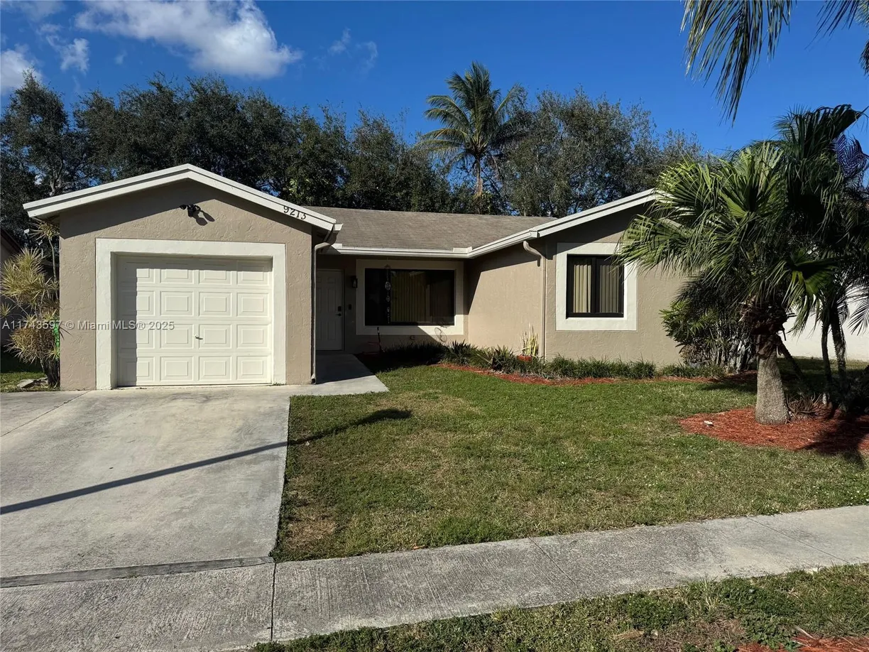 South Florida Real Estate | View 9213 NW 53rd Ct | 3 Beds, 2 Baths