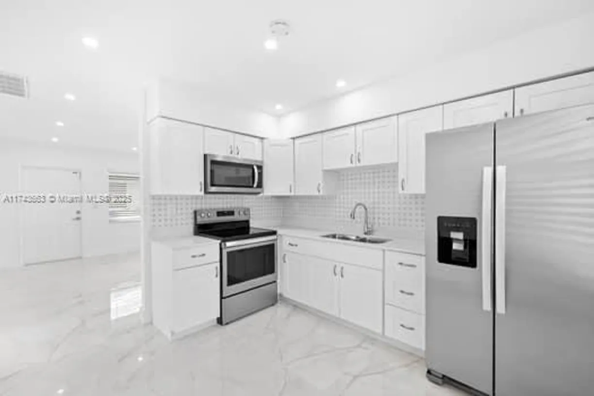 South Florida Real Estate | View 1431-1433 N 14th Way