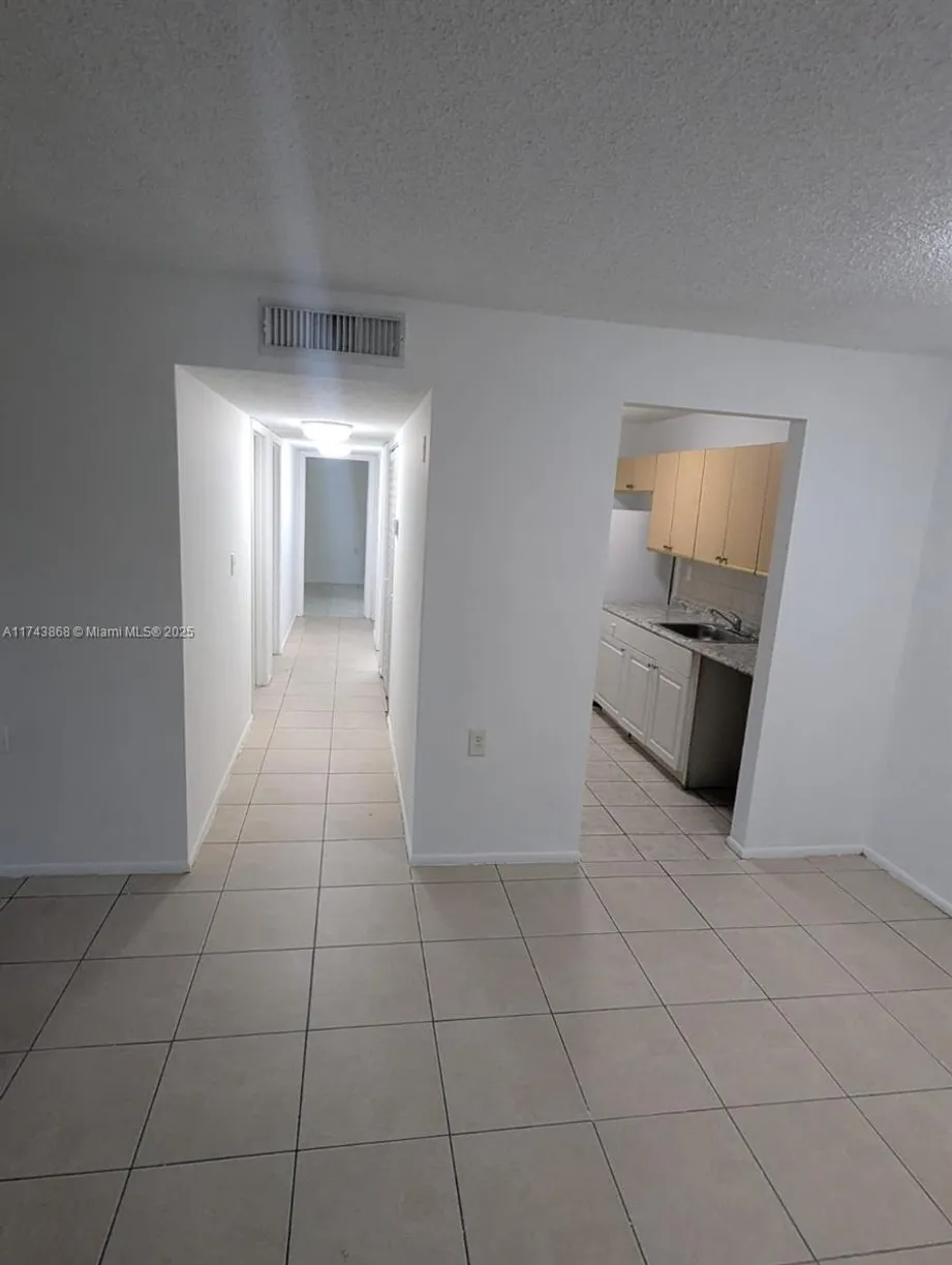 South Florida Real Estate | View 1200 Lake Victoria Dr, K | 3 Beds, 2 Baths