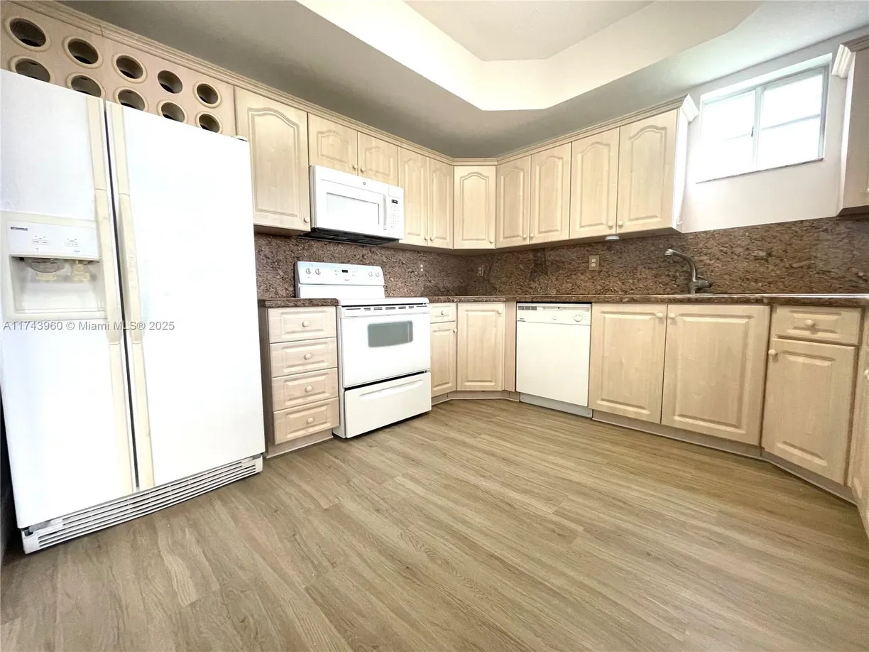 South Florida Real Estate | View 17415 NW 75th Pl, 208 | Listing
