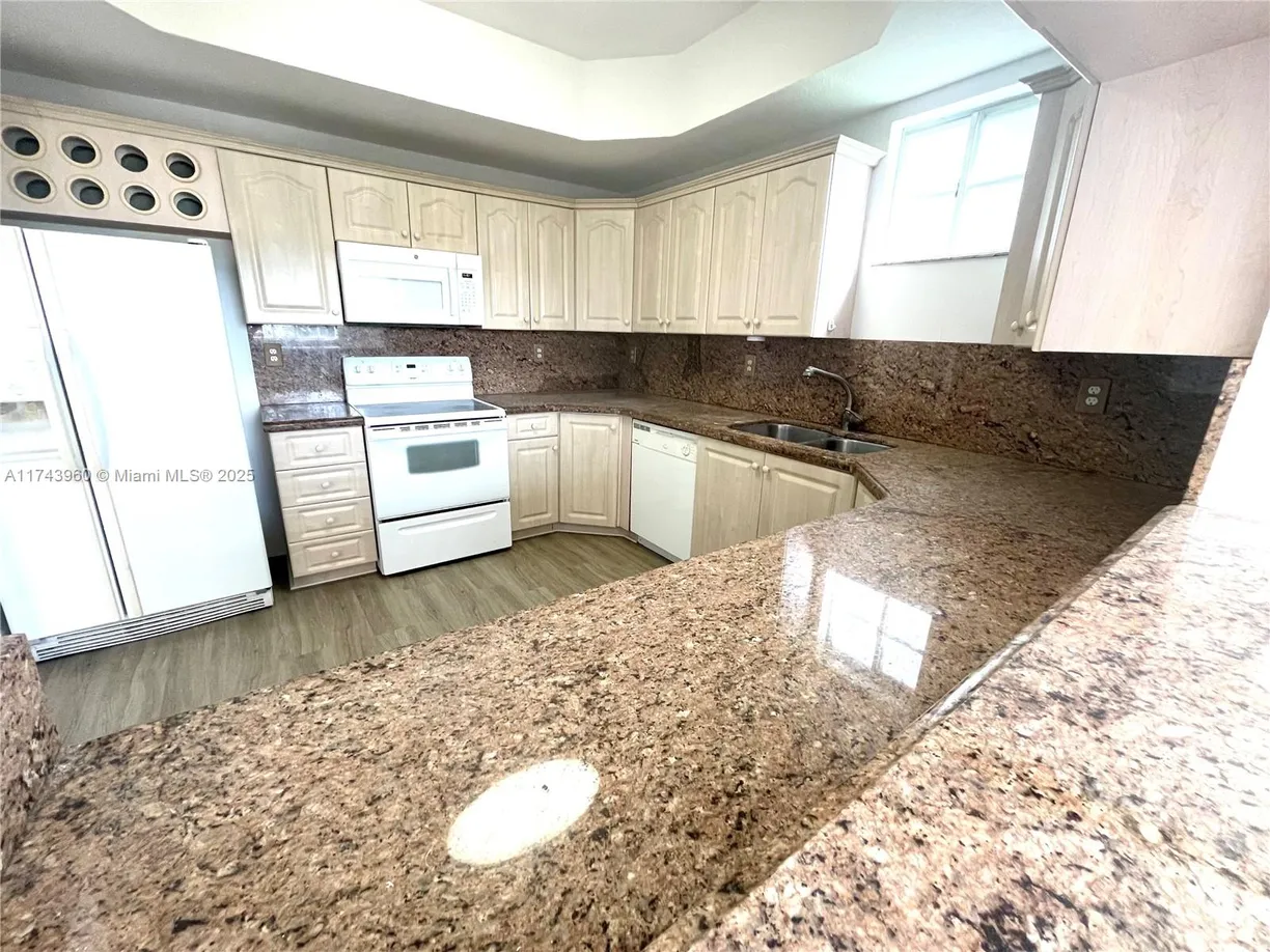 South Florida Real Estate | View 17415 NW 75th Pl, 208 | Listing