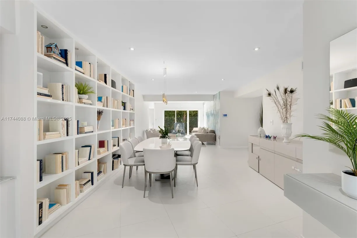 South Florida Real Estate | View 590 W 49th St | 4 Beds, 3 Baths