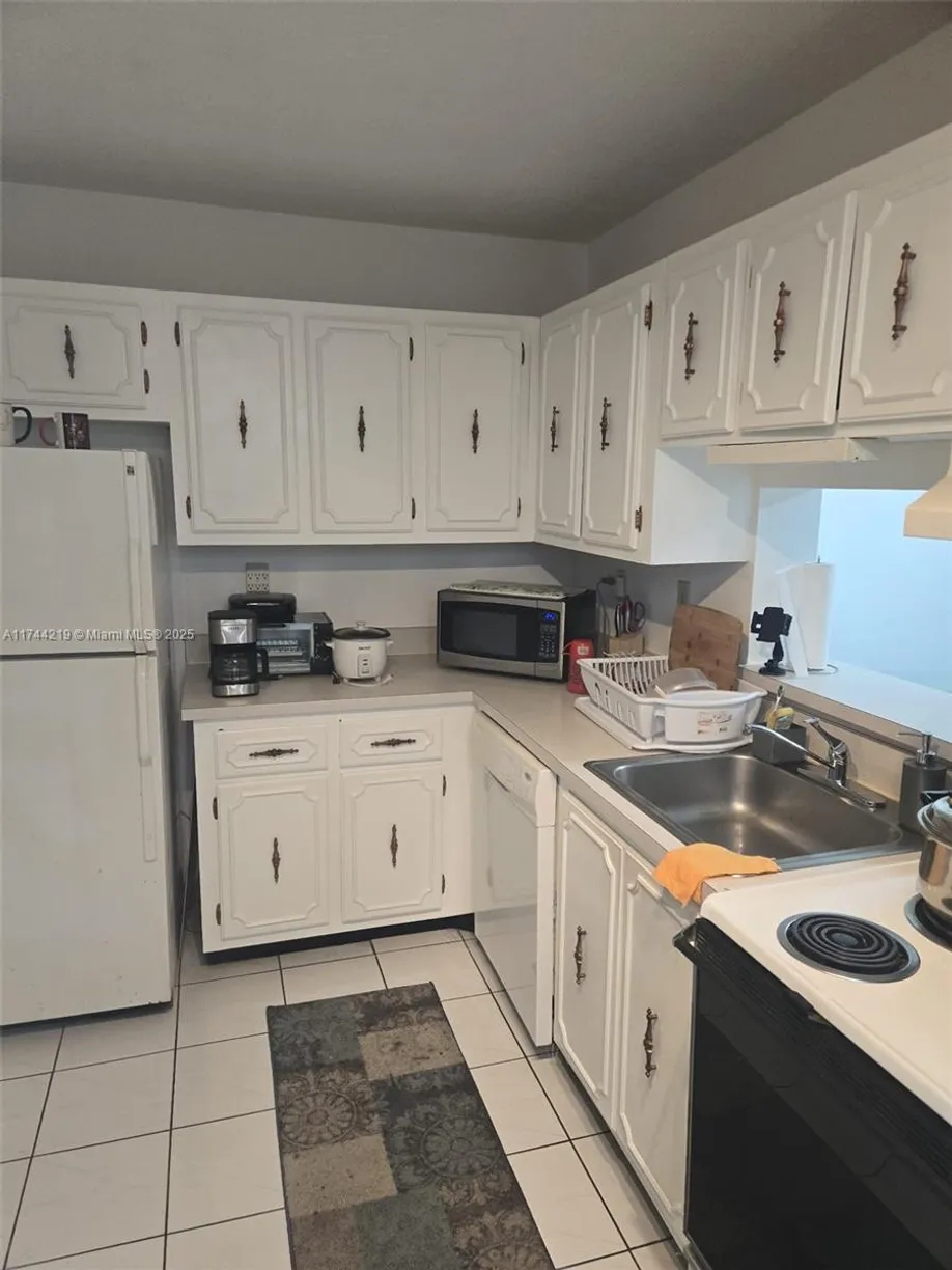 South Florida Real Estate | View 5201 NW 7th St, 403 | 1 Bed, 1 Bath