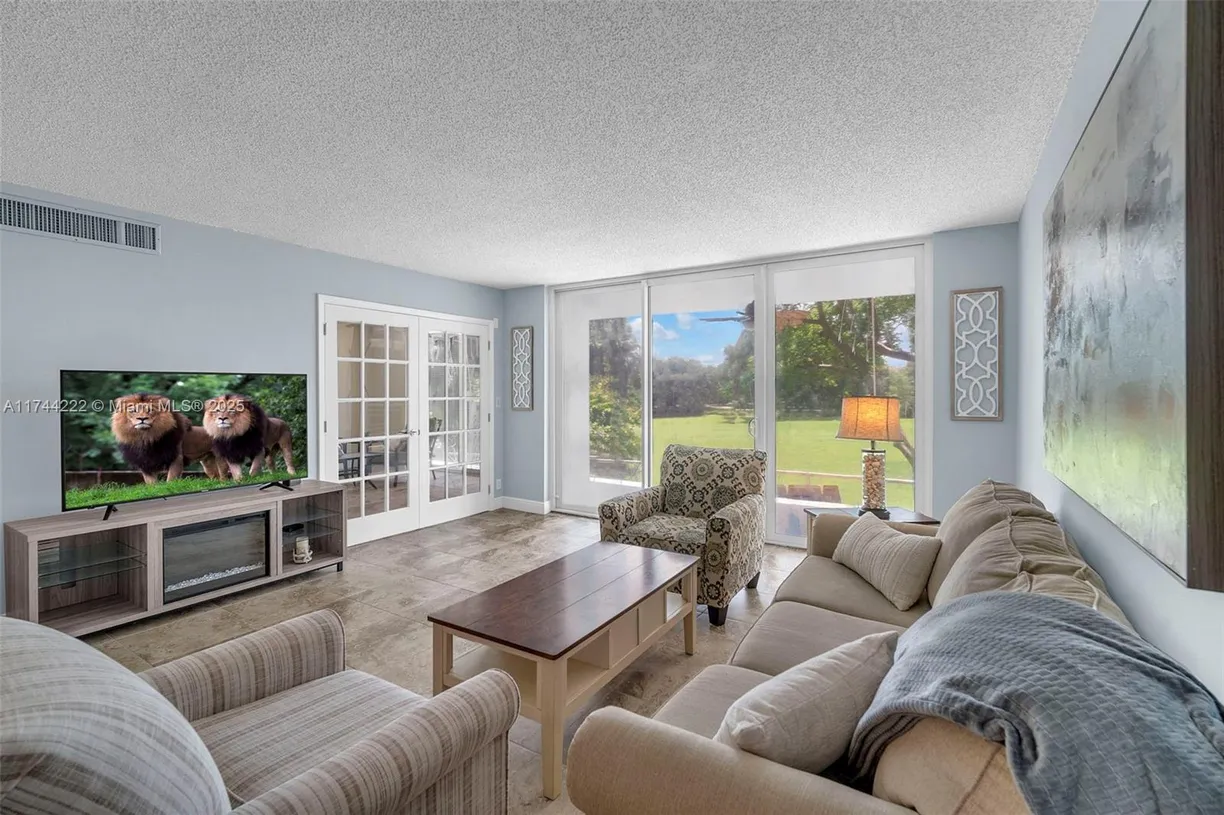 South Florida Real Estate | View 4000 Cypress Grove Way, 210 | Listing