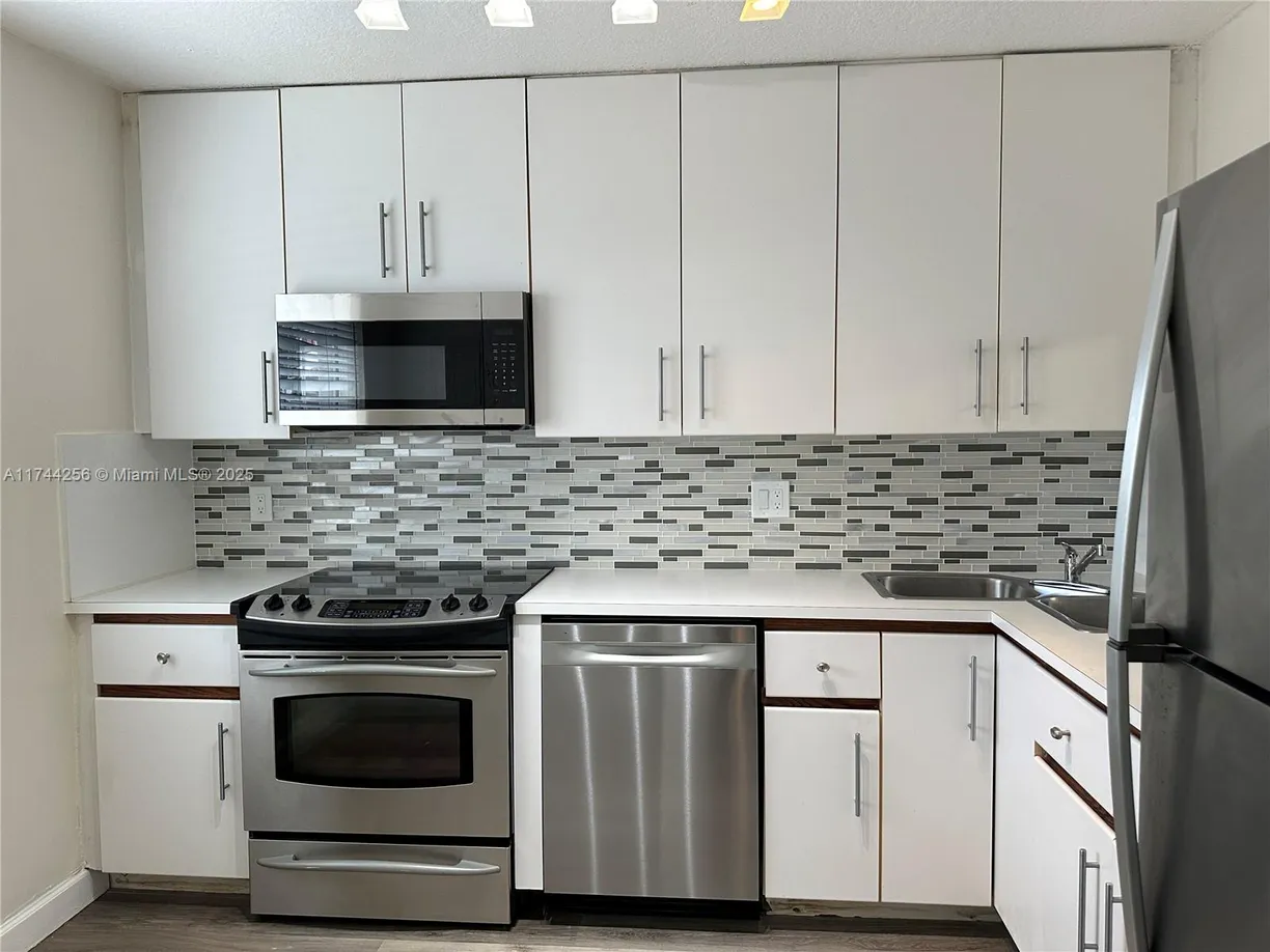 South Florida Real Estate | View 1480 Springside Dr, 1480 | Listing