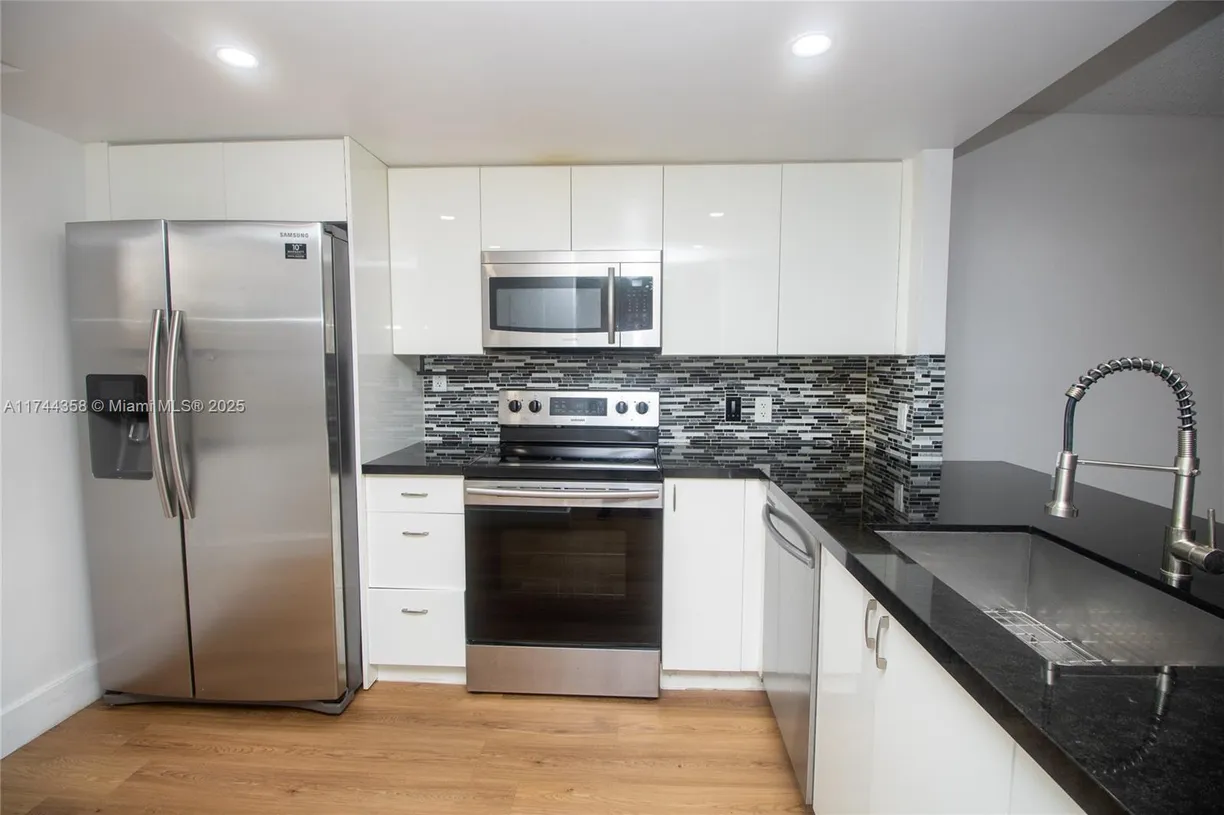 South Florida Real Estate | View 7200 NW 1st St, 103 | 2 Beds, 2 Baths
