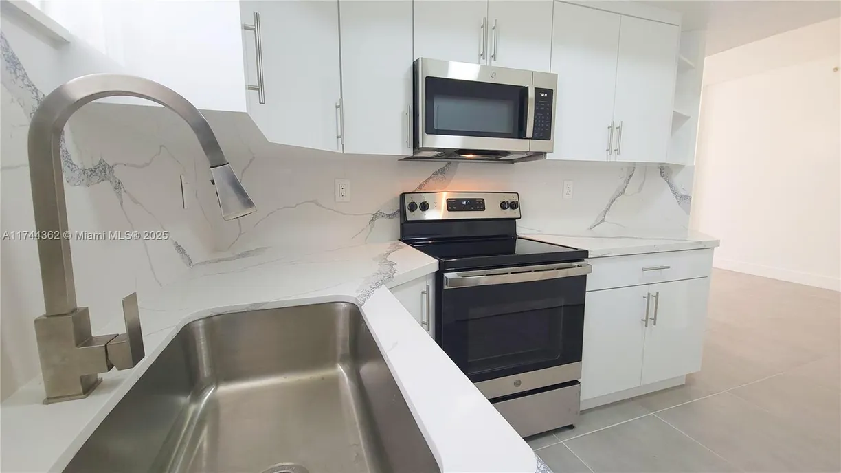 South Florida Real Estate | View 17405 NW 75th Pl, 112 | 3 Beds, 2 Baths