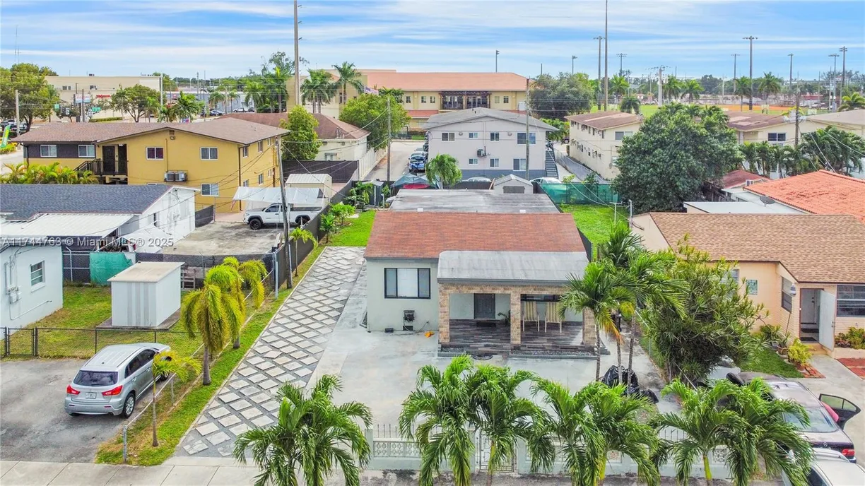 South Florida Real Estate | View 822 W 30th St | 4 Beds, 2 Baths