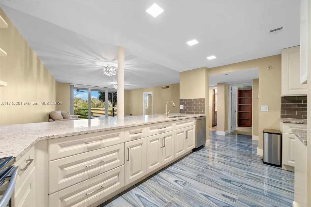 South Florida Real Estate | View 3499 Oaks Way # 205 | 2 Beds, 2 Baths
