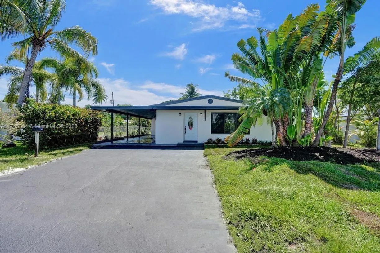 South Florida Real Estate | View 1628 NE 7th Ave | 4 Beds, 2 Baths