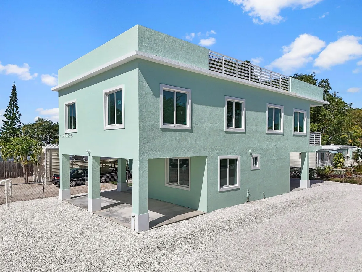 South Florida Real Estate | View 101 Kay Dr | 4 Beds, 3 Baths