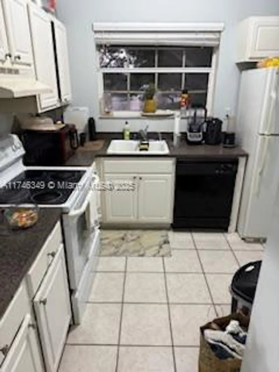South Florida Real Estate | View 1821 NW 96th Ter, 5O | 2 Beds, 2 Baths