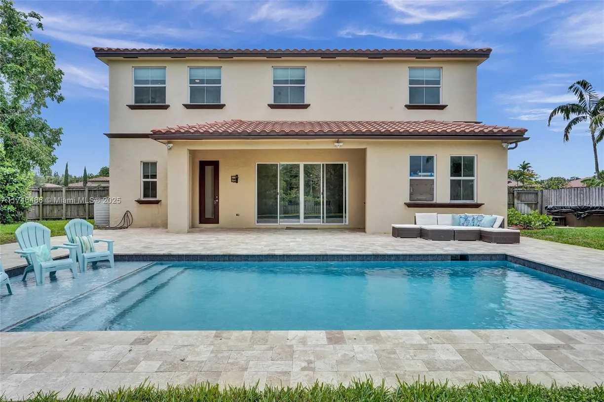 South Florida Real Estate | View 6455 SW 55th Pl | 4 Beds, 3 Baths