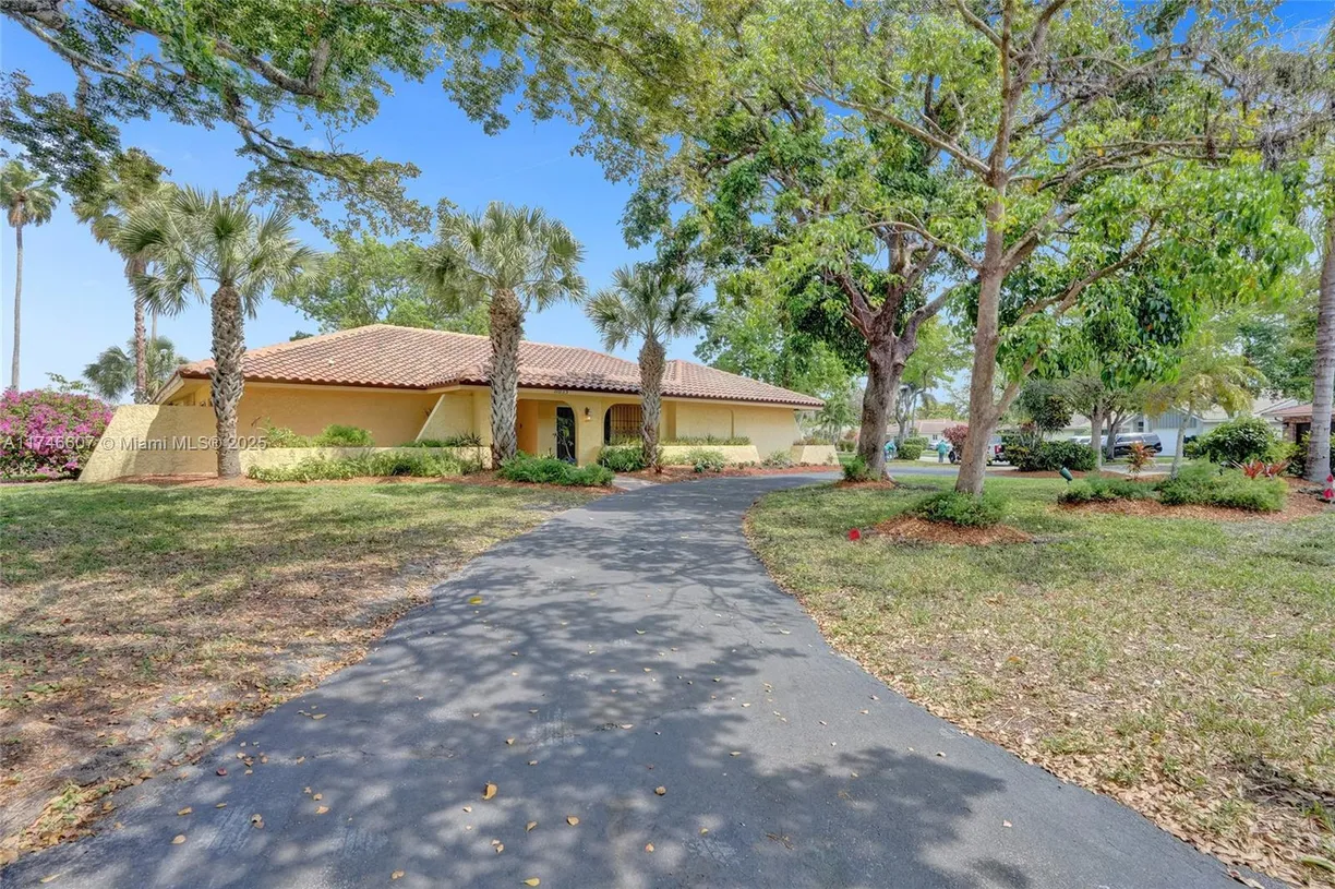 South Florida Real Estate | View 11033 NW 17th Pl | 4 Beds, 3 Baths