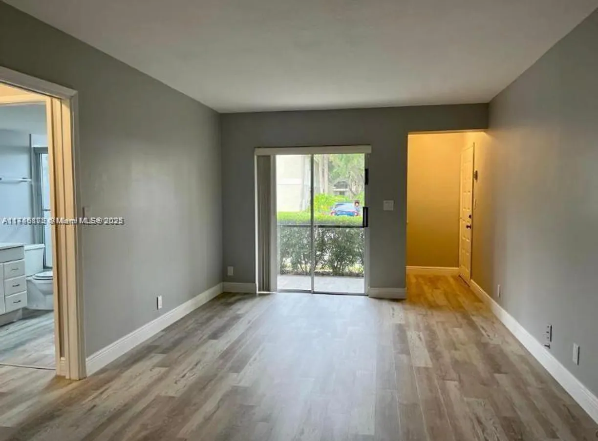 South Florida Real Estate | View 105 Gardens Dr, 104 | Listing