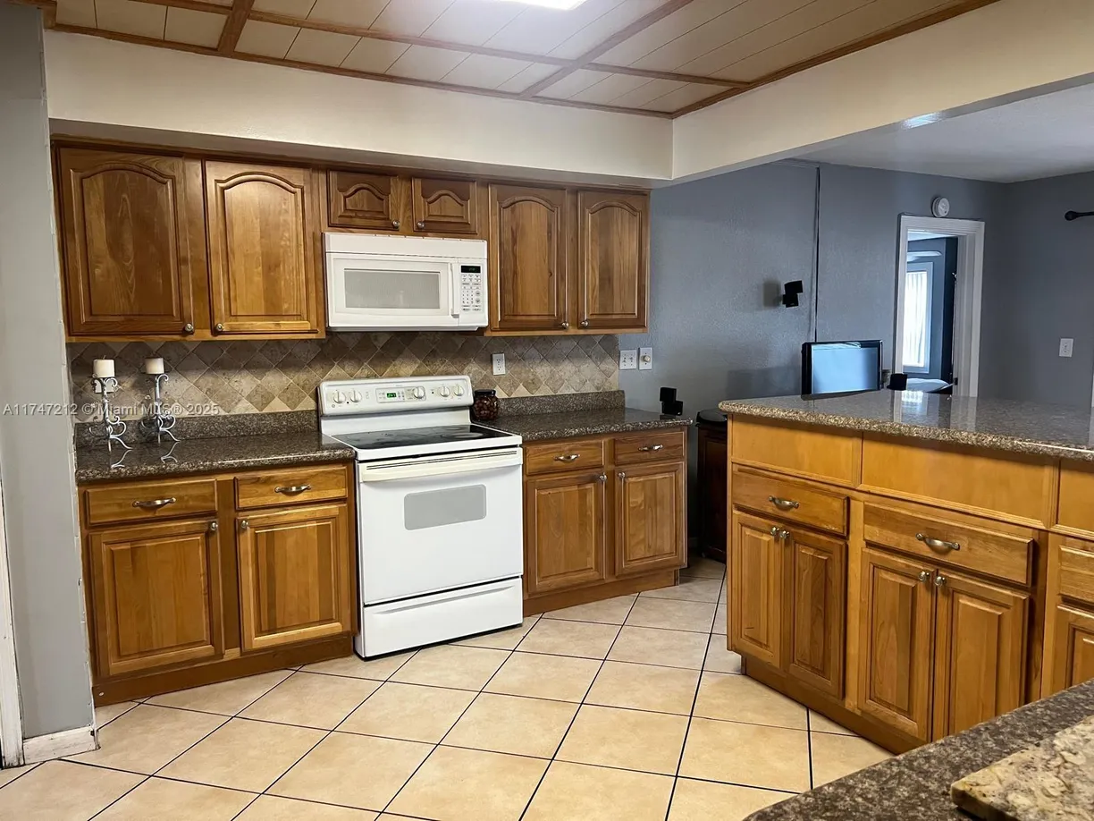 South Florida Real Estate | View 3057 Coral Springs Dr, 102 | 3 Beds, 2 Baths