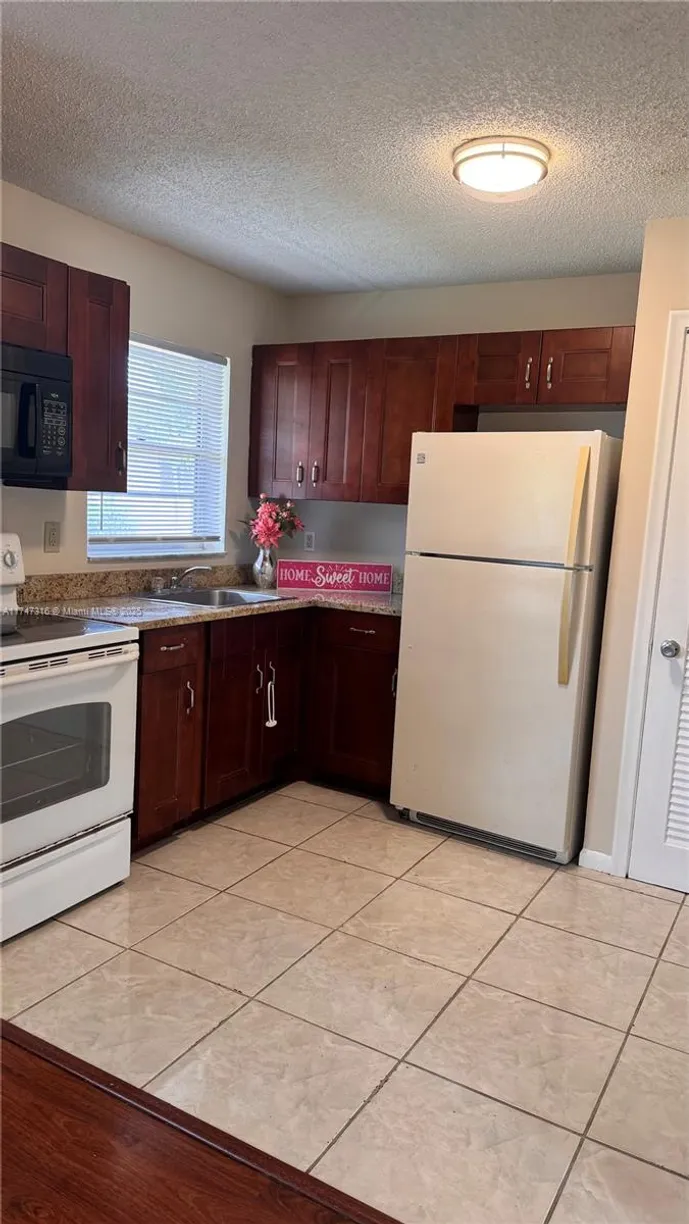 South Florida Real Estate | View 5150 NE 6th Ave, 120 | 2 Beds, 1 Bath