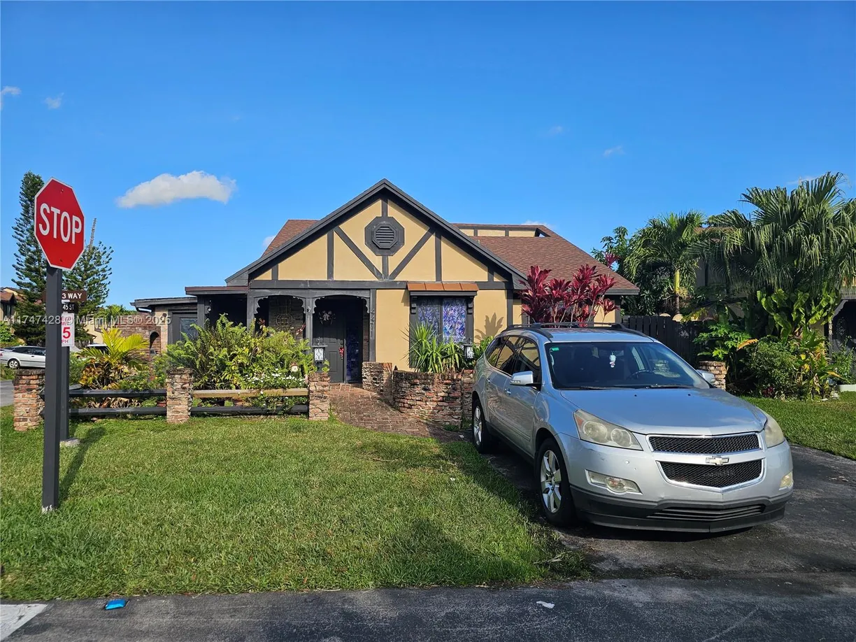 South Florida Real Estate | View 4471 NW 93rd Way | 3 Beds, 2 Baths