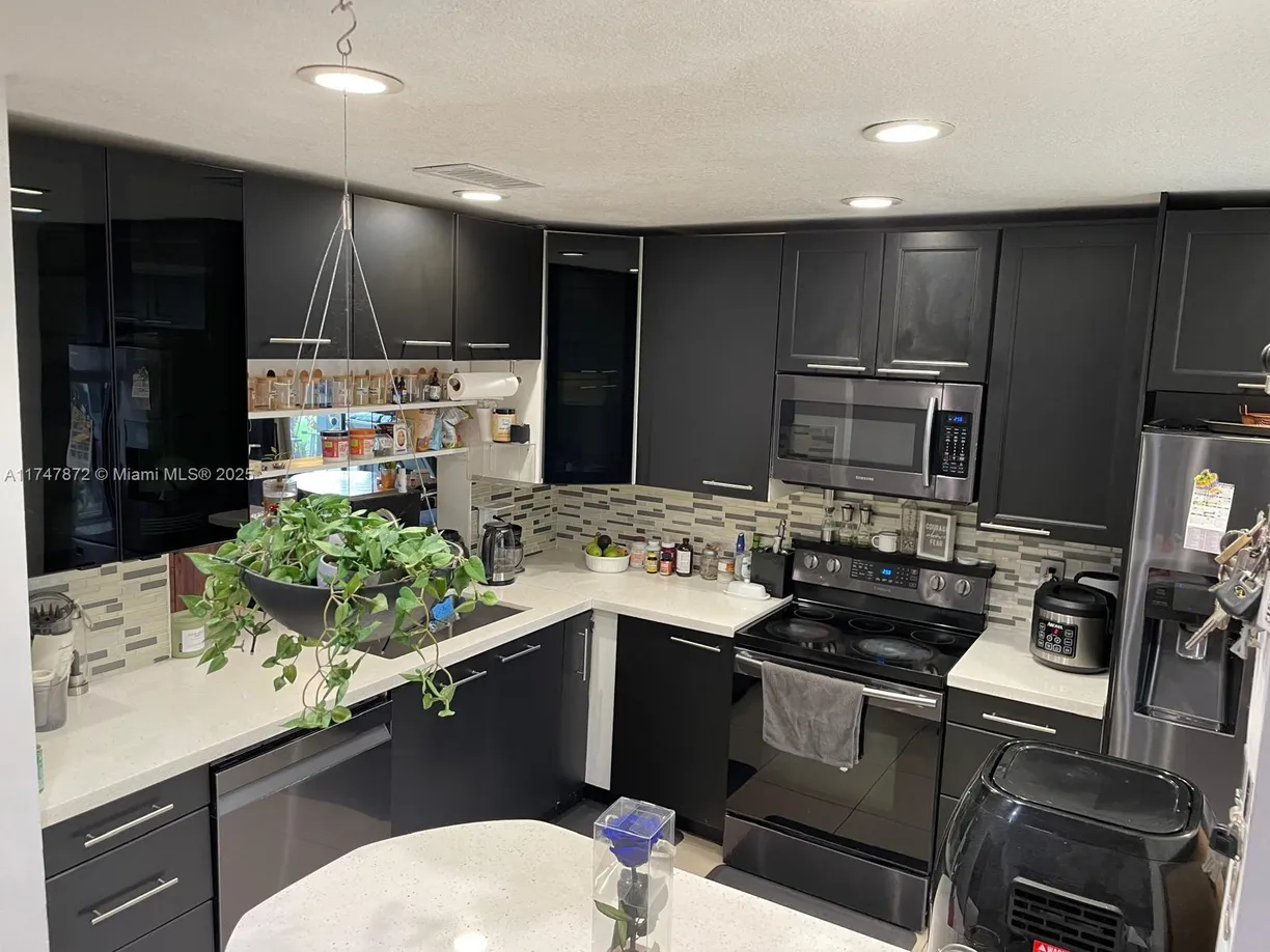 South Florida Real Estate | View 9272 NW 49th Pl | 3 Beds, 2 Baths