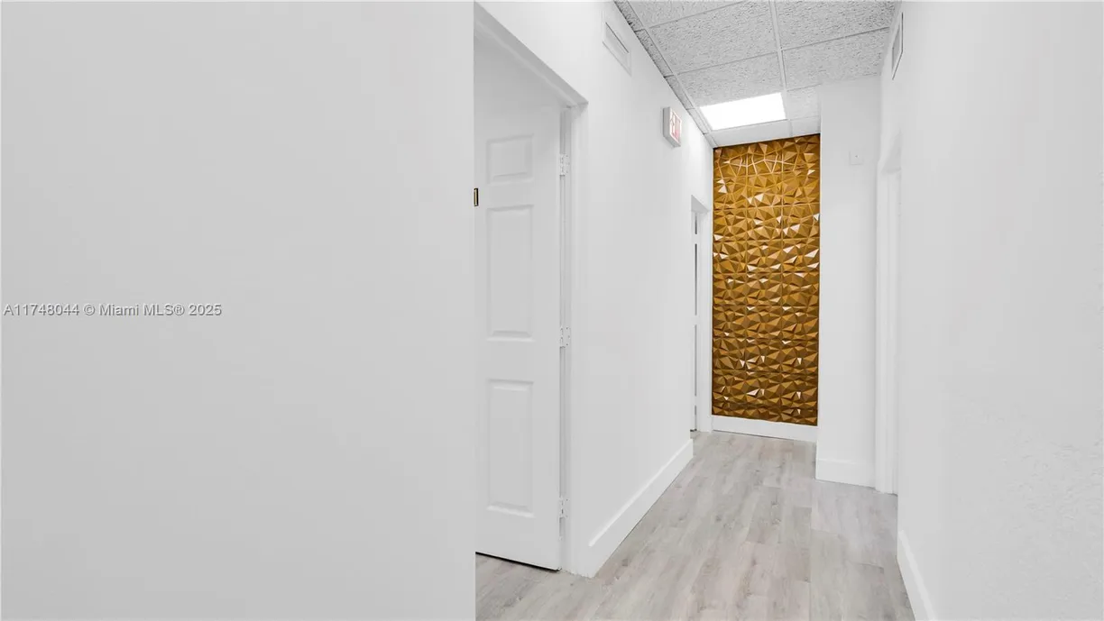 South Florida Real Estate | View 1900 N University Dr, 206-1 | Listing