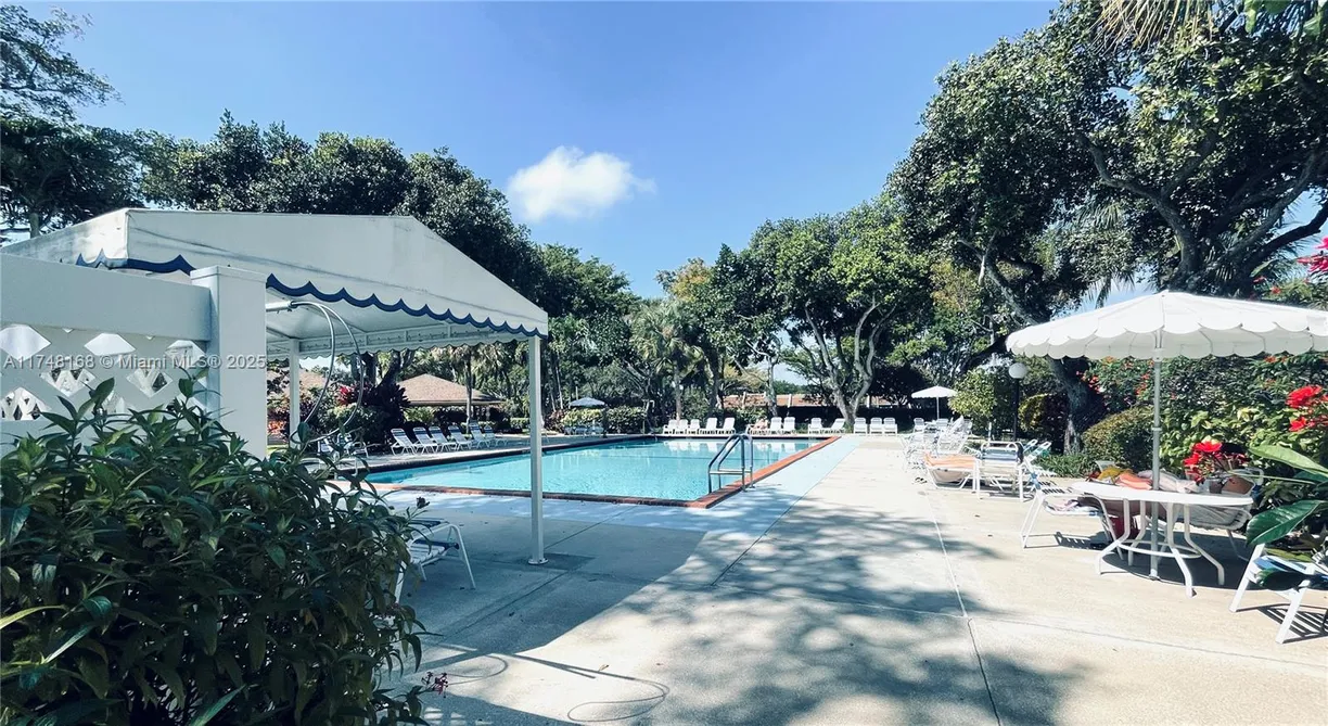 South Florida Real Estate | View 3800 Oaks Clubhouse Dr, 112 | 3 Beds, 2 Baths