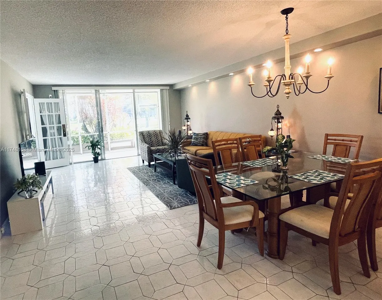 South Florida Real Estate | View 3800 Oaks Clubhouse Dr, 112 | Listing