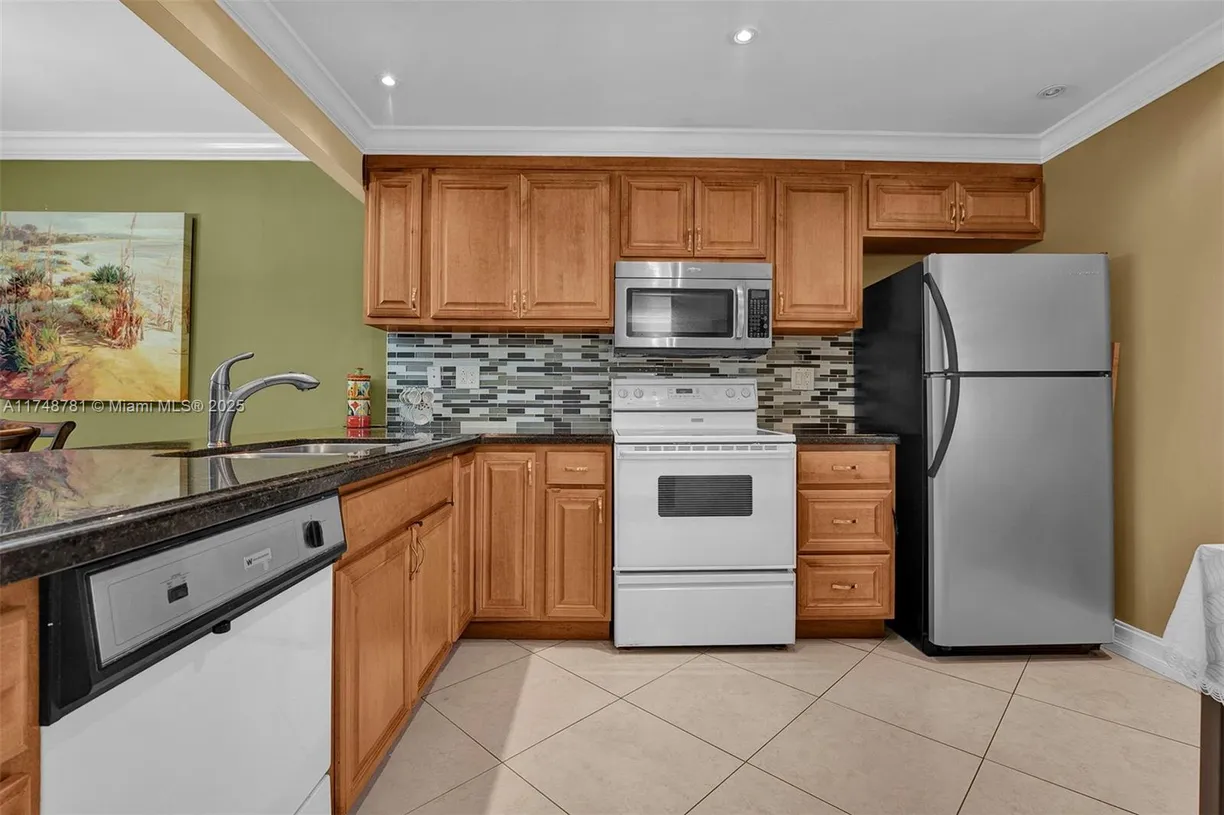 South Florida Real Estate | View 3010 N Course Dr, 310 | Listing