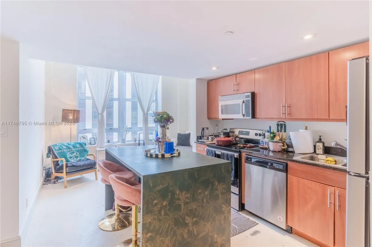 South Florida Real Estate | View 111 E Flagler St, 805 | 2 Beds, 1 Bath