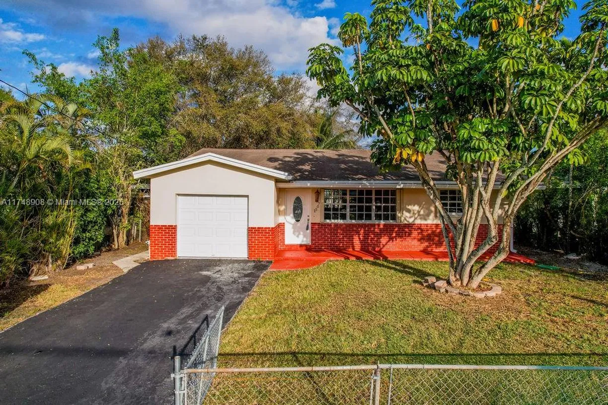South Florida Real Estate | View 1507 N 58th Ave | 4 Beds, 2 Baths