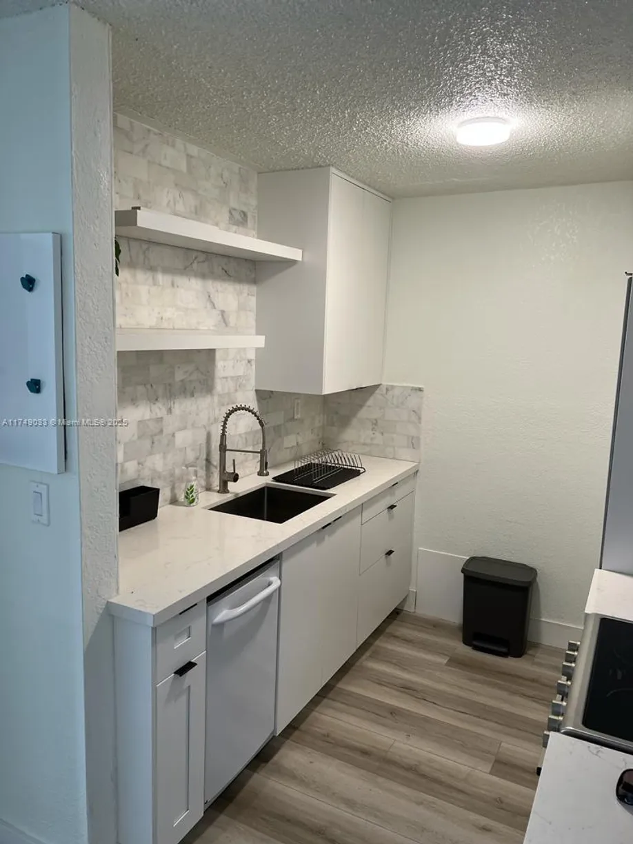South Florida Real Estate | View 444 SW 4th St, 102 | Listing