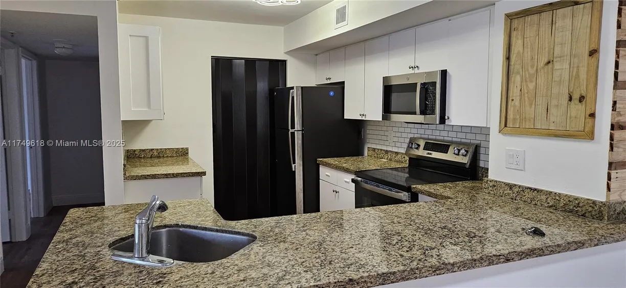 South Florida Real Estate | View 3830 Lyons Rd, 112-3 | Listing