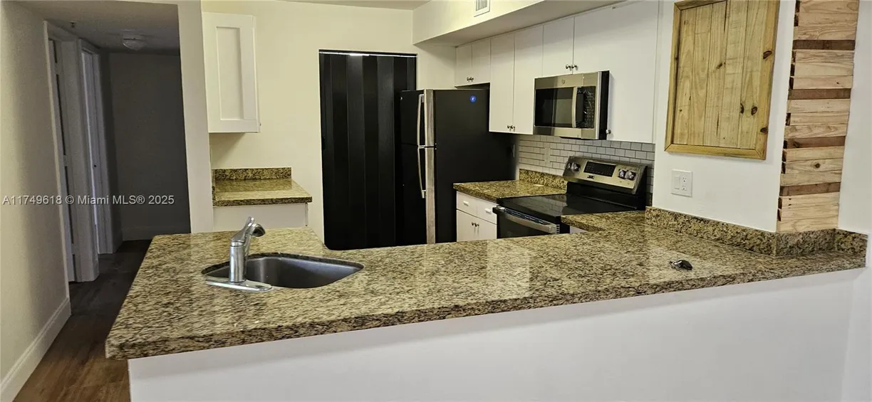 South Florida Real Estate | View 3830 Lyons Rd, 112-3 | 3 Beds, 2 Baths