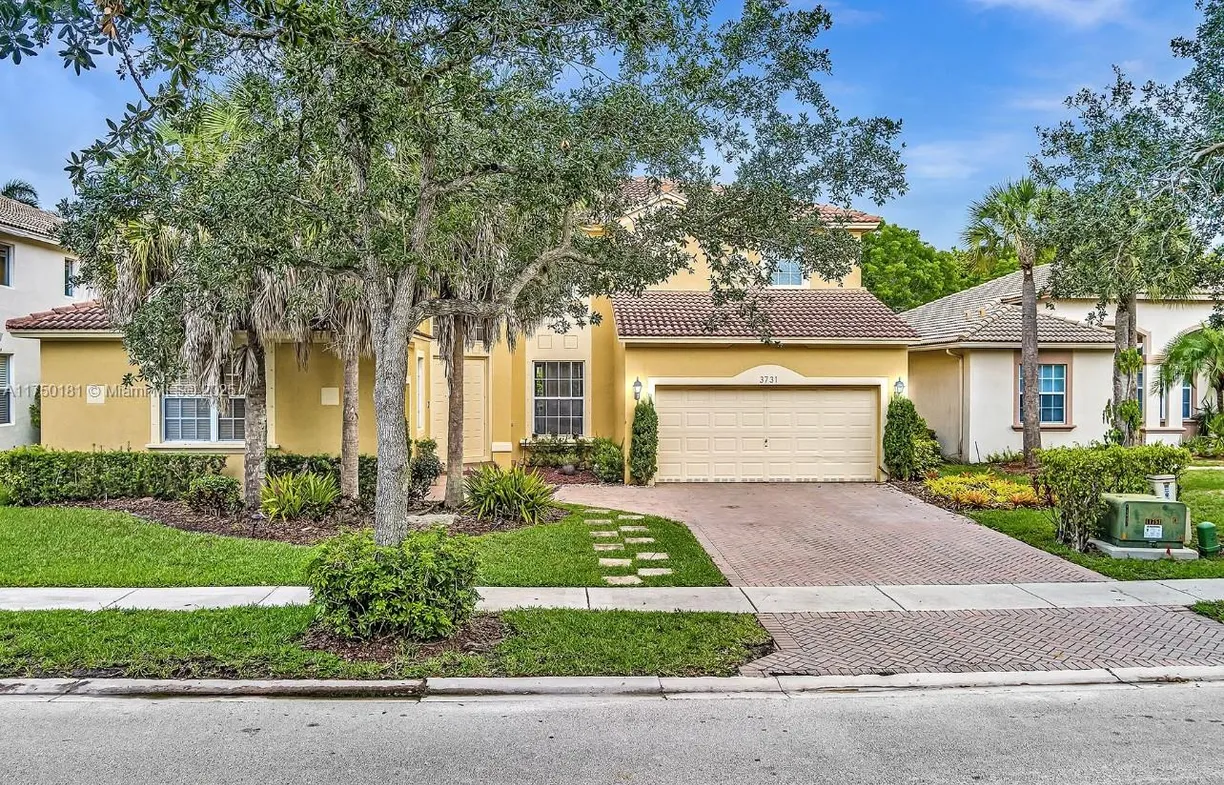 South Florida Real Estate | View 3731 W Gardenia Ave | 5 Beds, 3 Baths