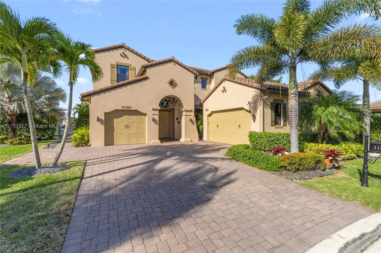 South Florida Real Estate | View 11360 NW 83rd Way | 5 Beds, 5 Baths