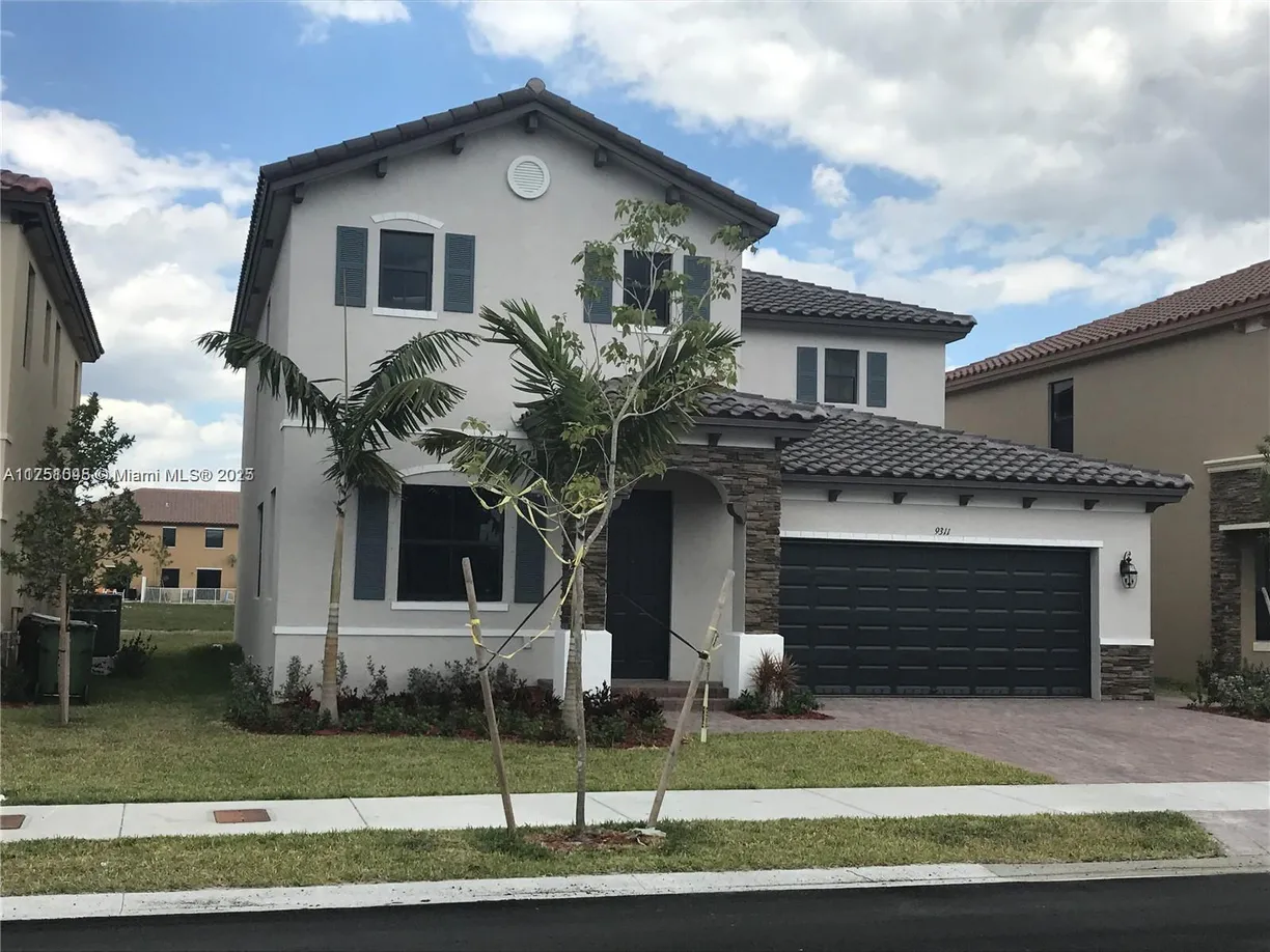 South Florida Real Estate | View 9311 W 35th Ave, 9311 | 5 Beds, 3 Baths
