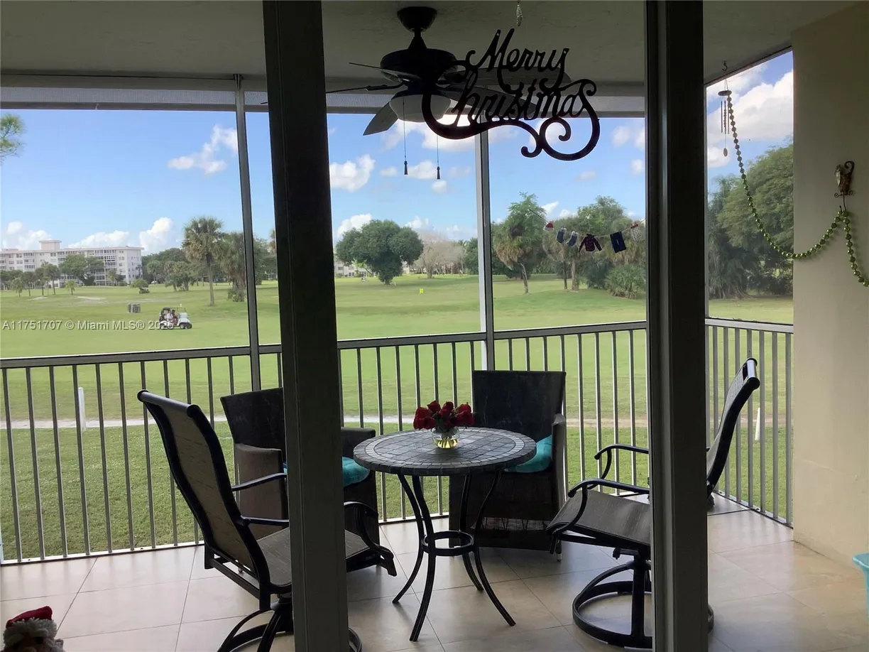 South Florida Real Estate | View 2601 S Course Dr, 210 | Listing