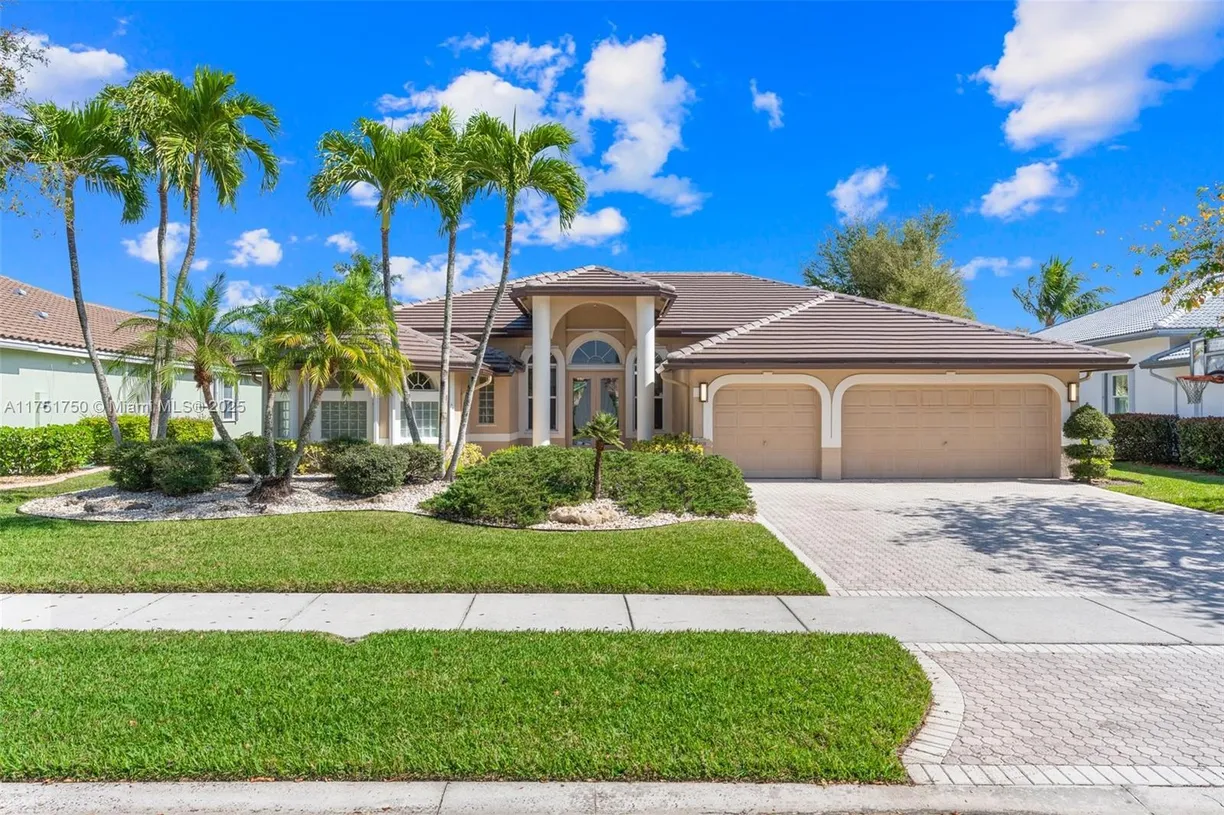 South Florida Real Estate | View 5135 Kensington Cir | 5 Beds, 3 Baths