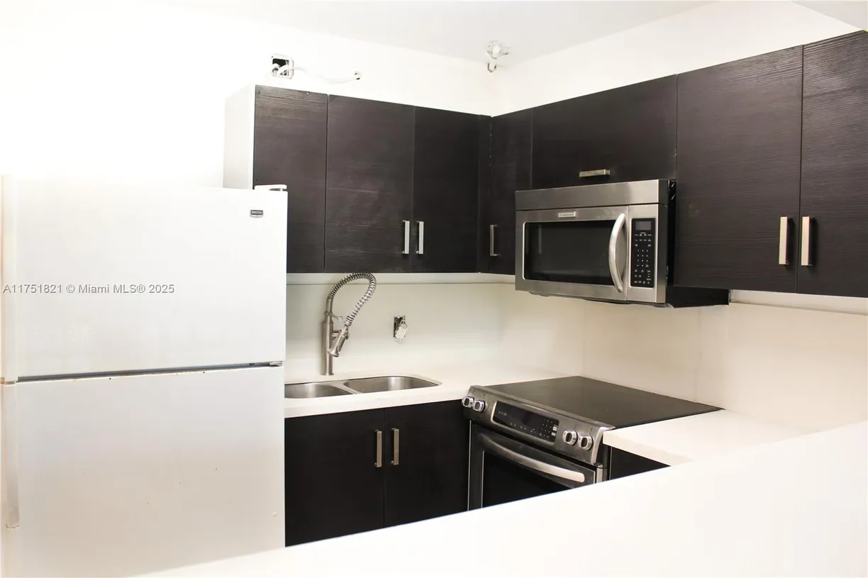 South Florida Real Estate | View 319 Newport V, 319 | Listing