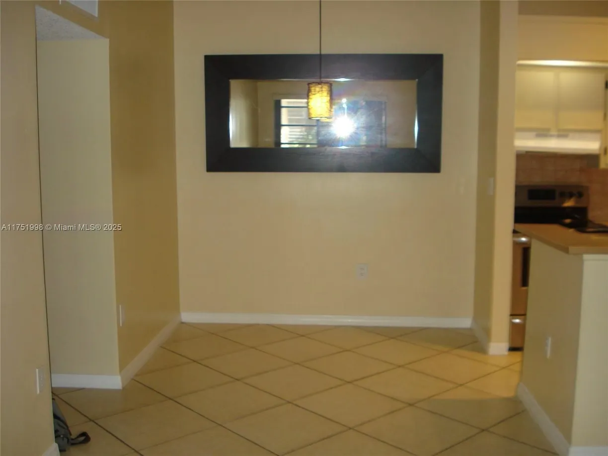 South Florida Real Estate | View 18965 NW 62nd Ave, 205 | Listing
