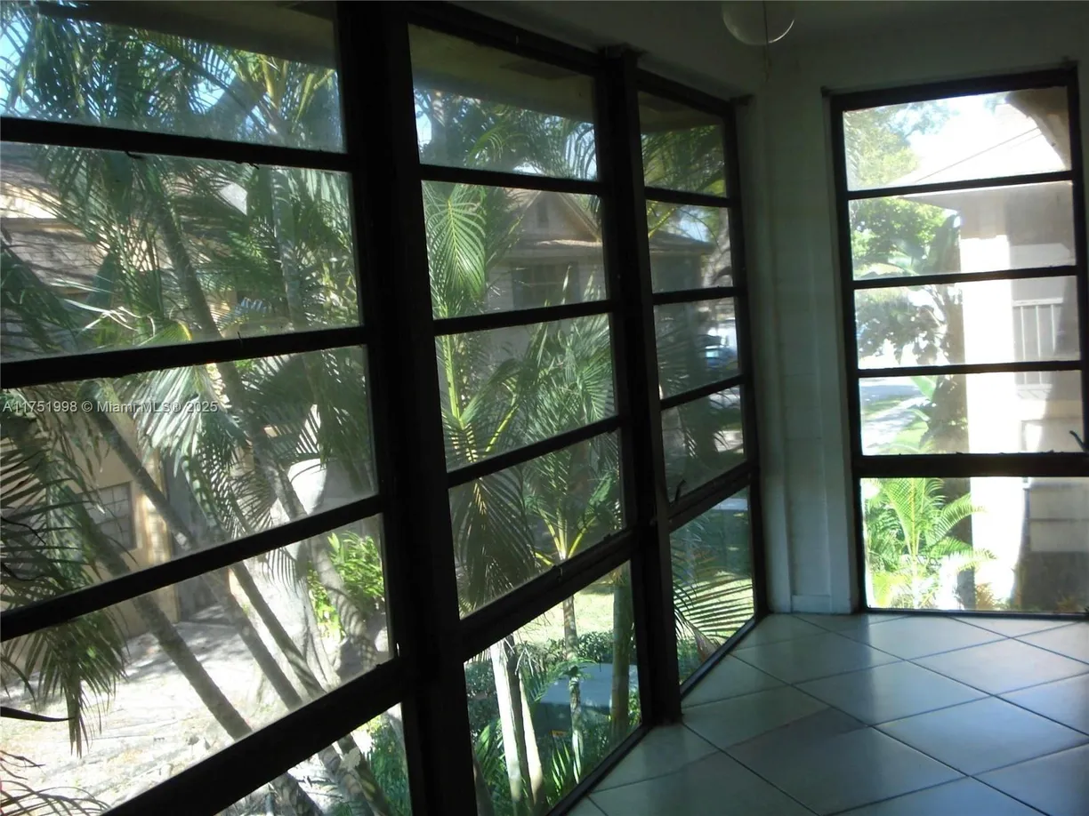 South Florida Real Estate | View 18965 NW 62nd Ave, 205 | 2 Beds, 1 Bath