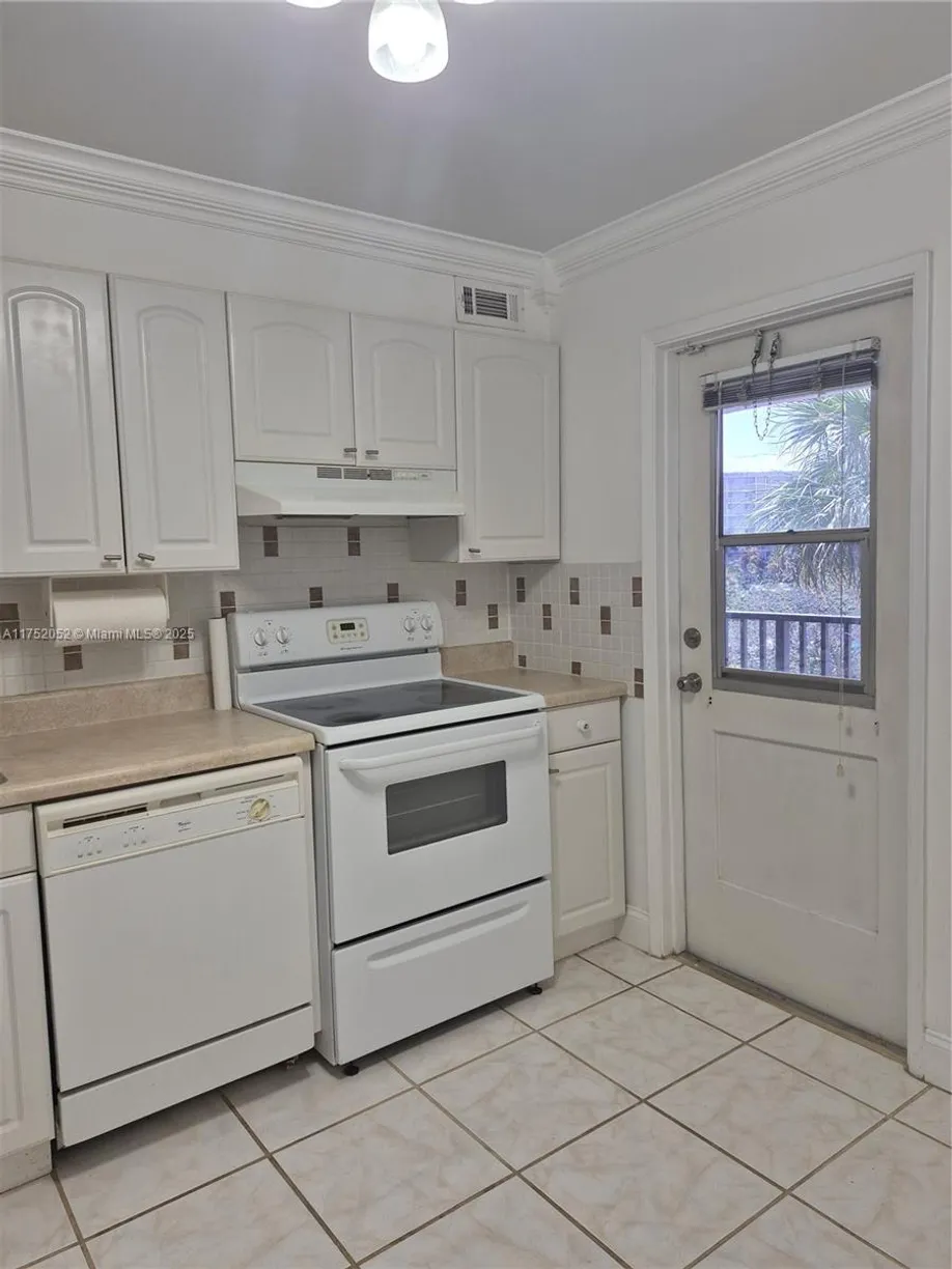 South Florida Real Estate | View 2650 S Course Dr, 410 | Listing
