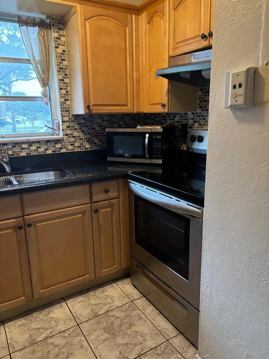 South Florida Real Estate | View 8005 Lagos De Campo Blvd, L-4 | Listing