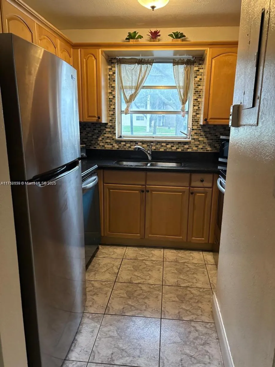 South Florida Real Estate | View 8005 Lagos De Campo Blvd, L-4 | Listing