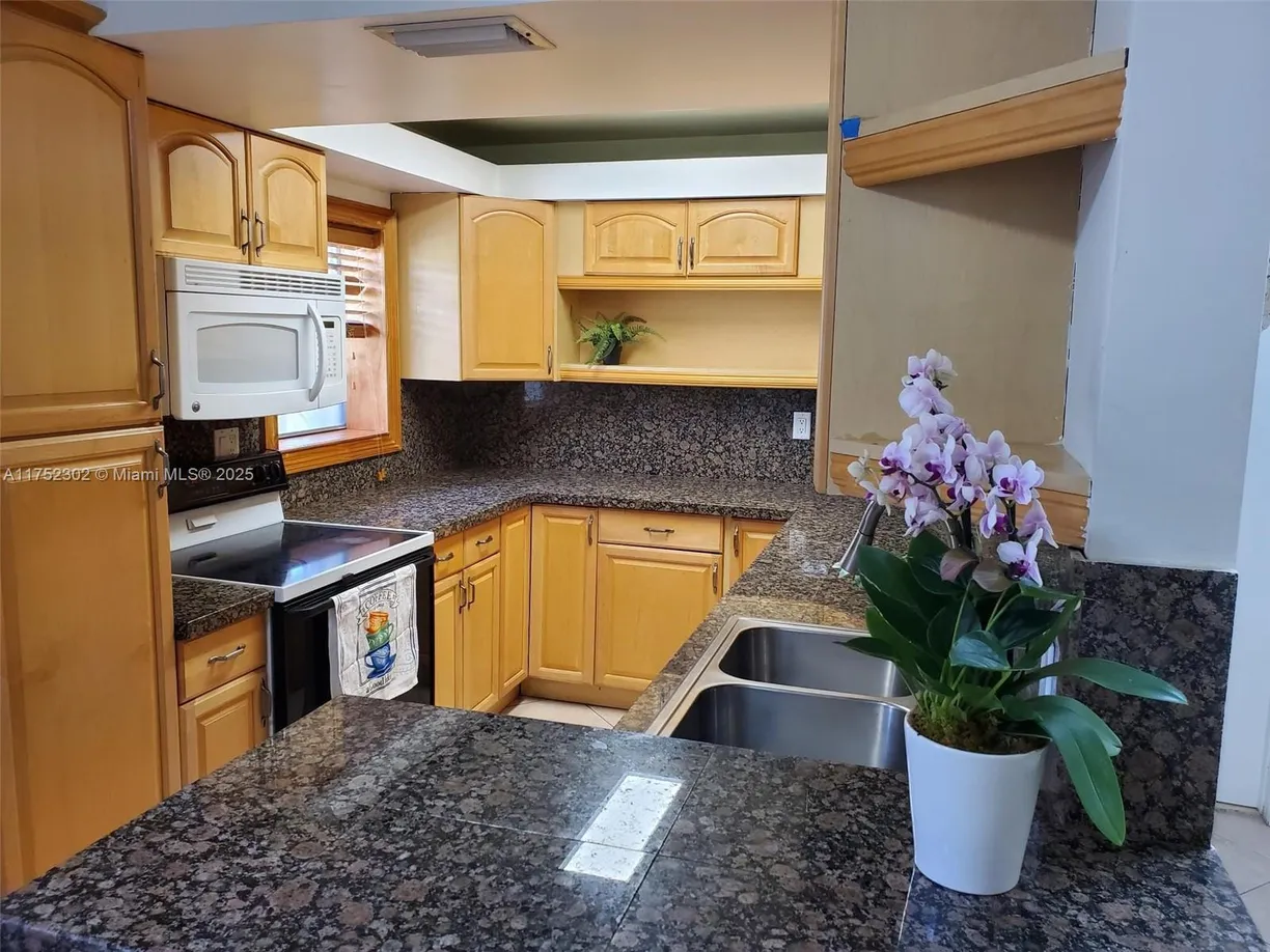 South Florida Real Estate | View 1016 NE 10th St, 1 | 2 Beds, 2 Baths