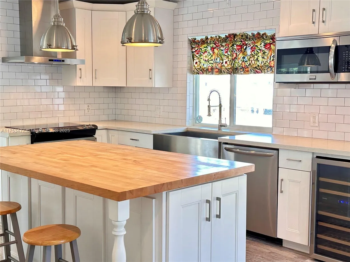 South Florida Real Estate | View 1485 NE 57th St | 4 Beds, 2 Baths